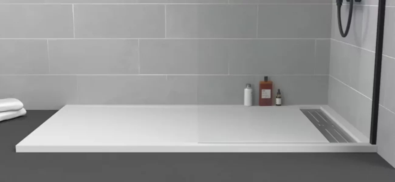 mejor material para plato ducha